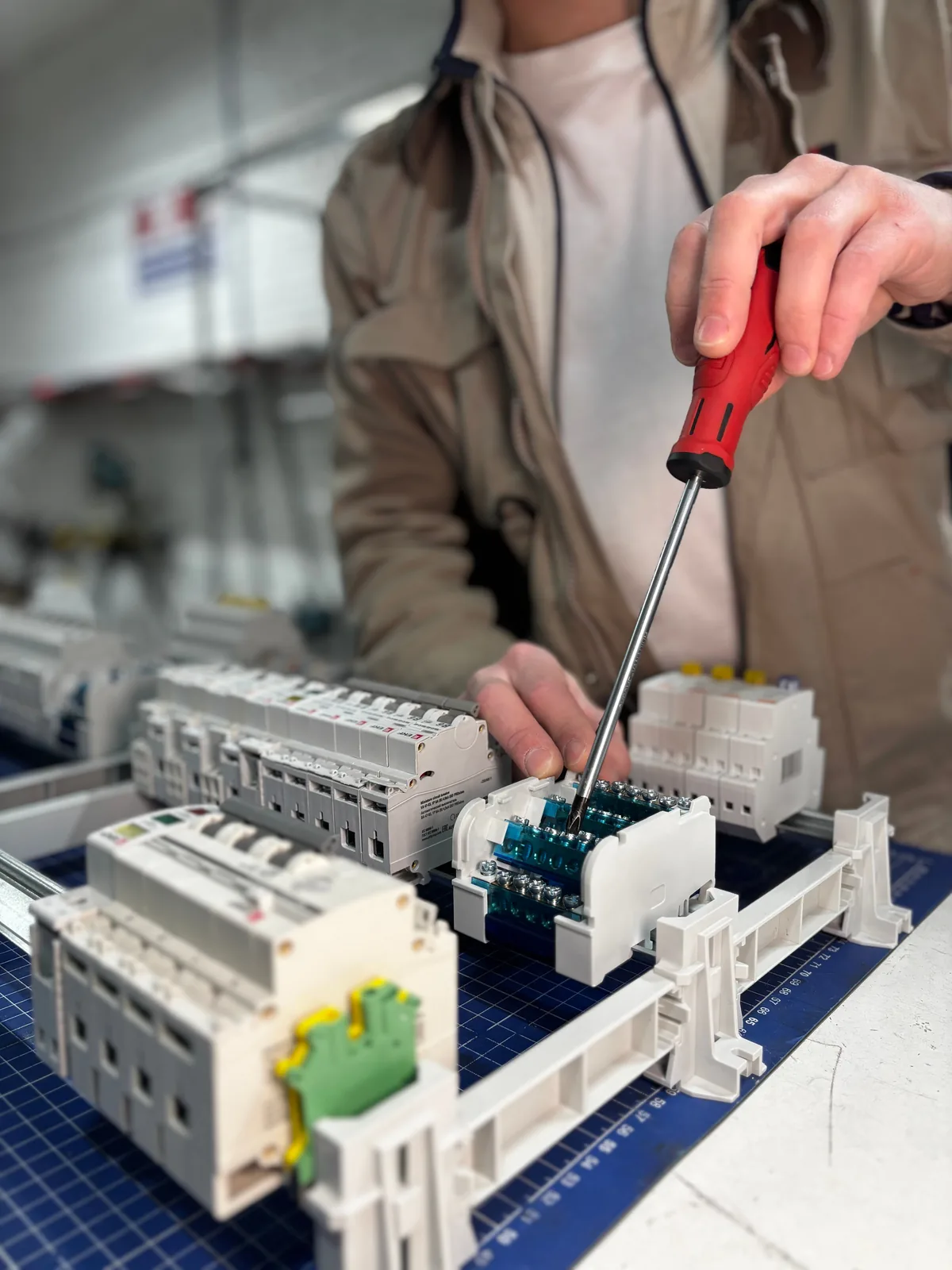 Breakers assembled on a DIN rail before installation, for licensed electrician in Oklahoma City