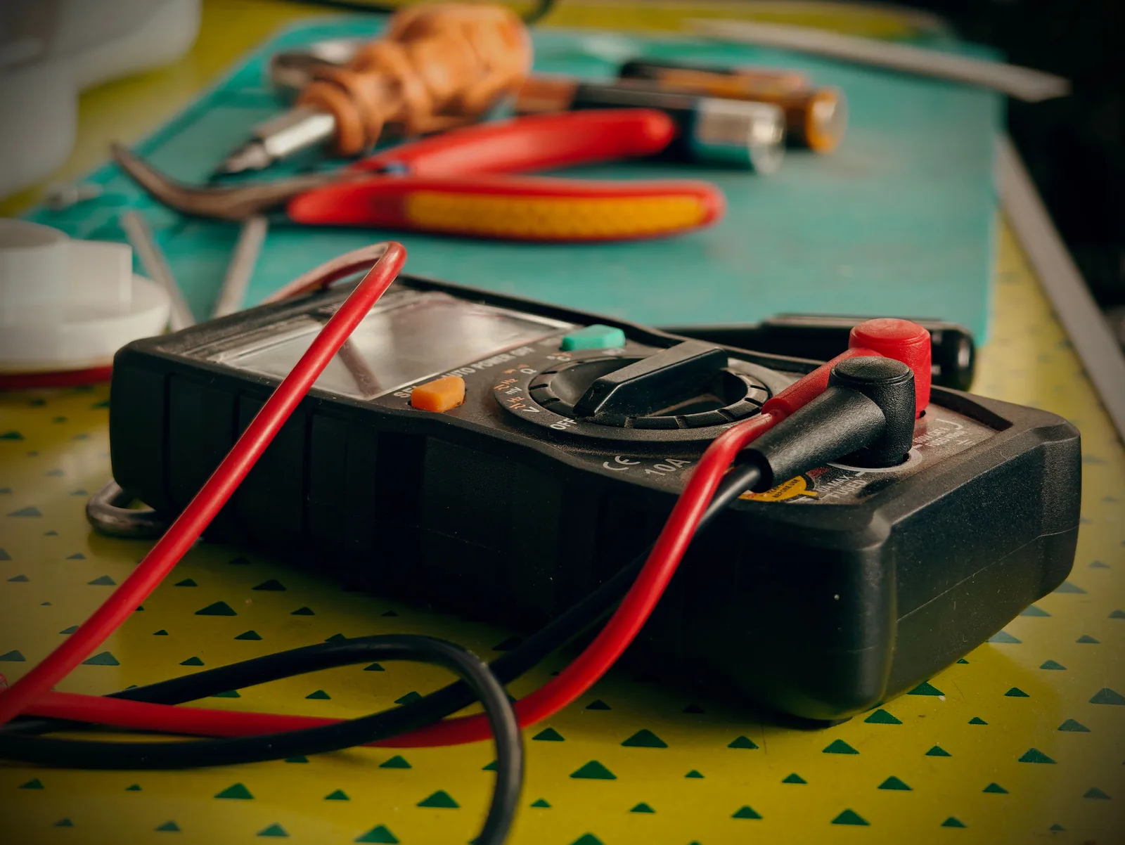 A multimeter and hand tools ready for a diagnostic visit, for electrician in Oklahoma City