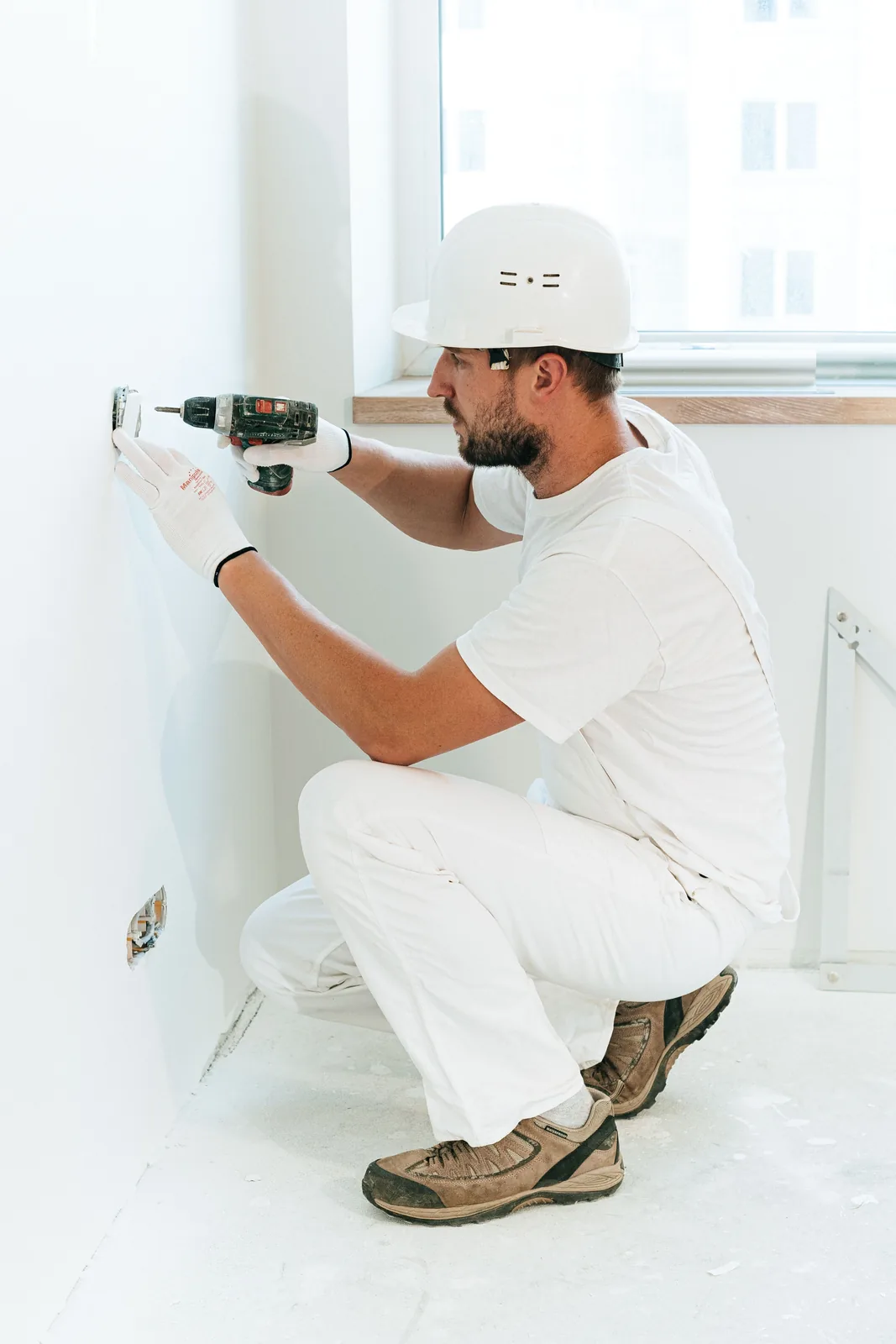 Fixing a socket into a finished wall, for electrician in Oklahoma City